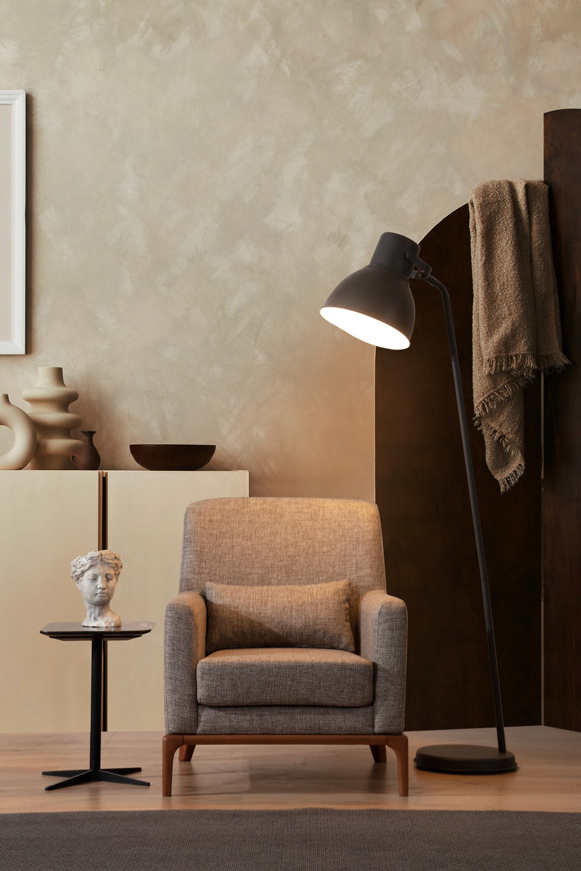 Darin upholstered armchair with exposed legs