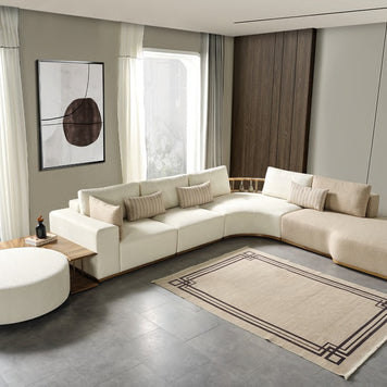 Neri modular corner sofa and round ottoman; freestanding side table excluded