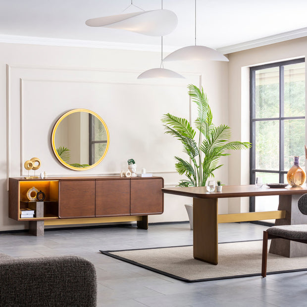Tavira dining table, chairs, sideboard and round mirror in a styled room